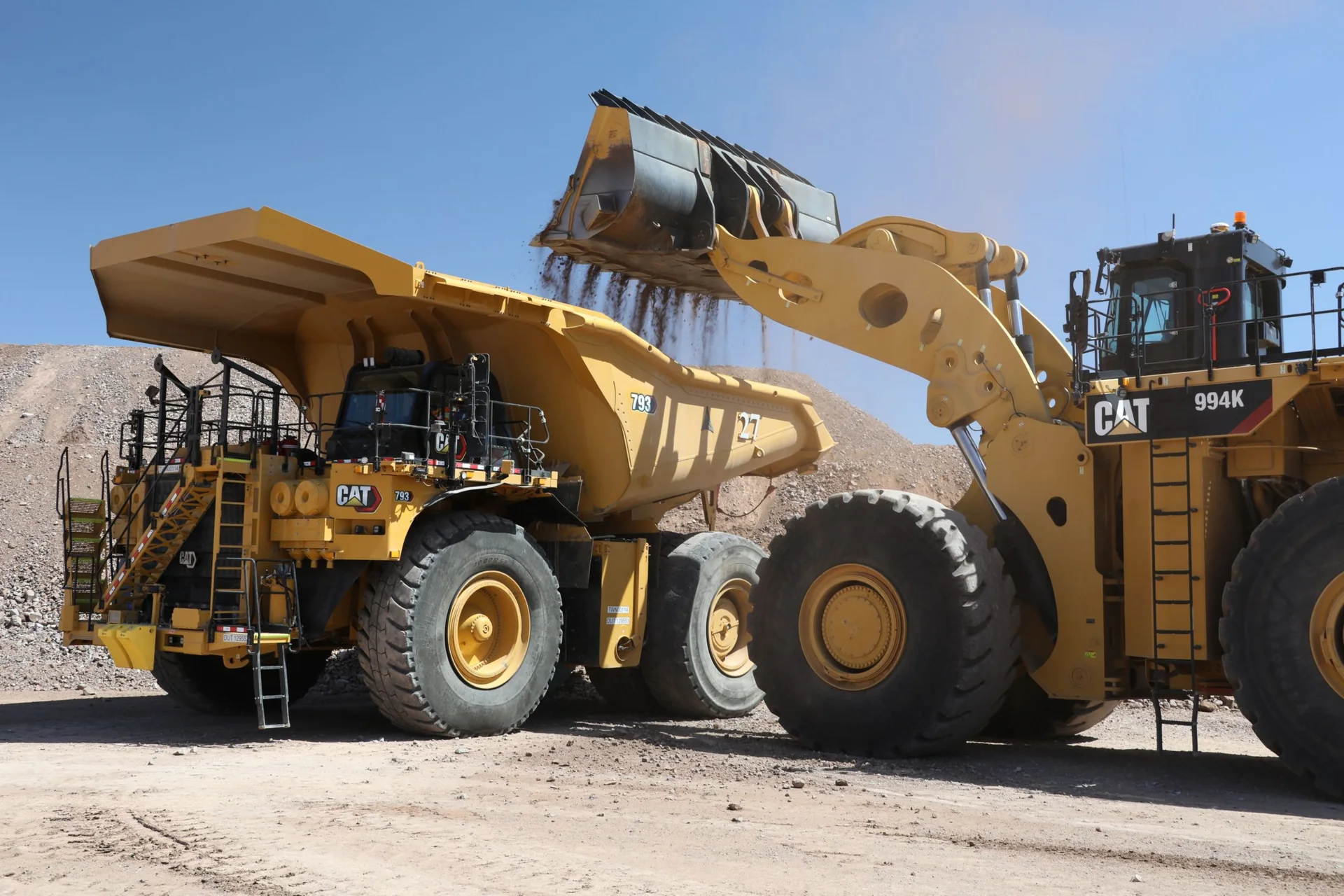 Wheel loader loading a mining haul truck.