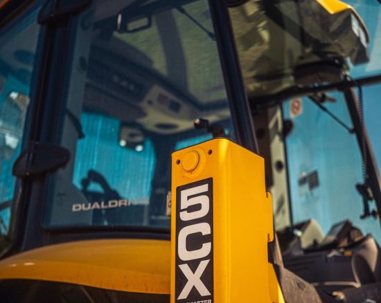 Be moved, even in park_ The JCB 5CX Backhoe Loader material handling on site for A Spicer_